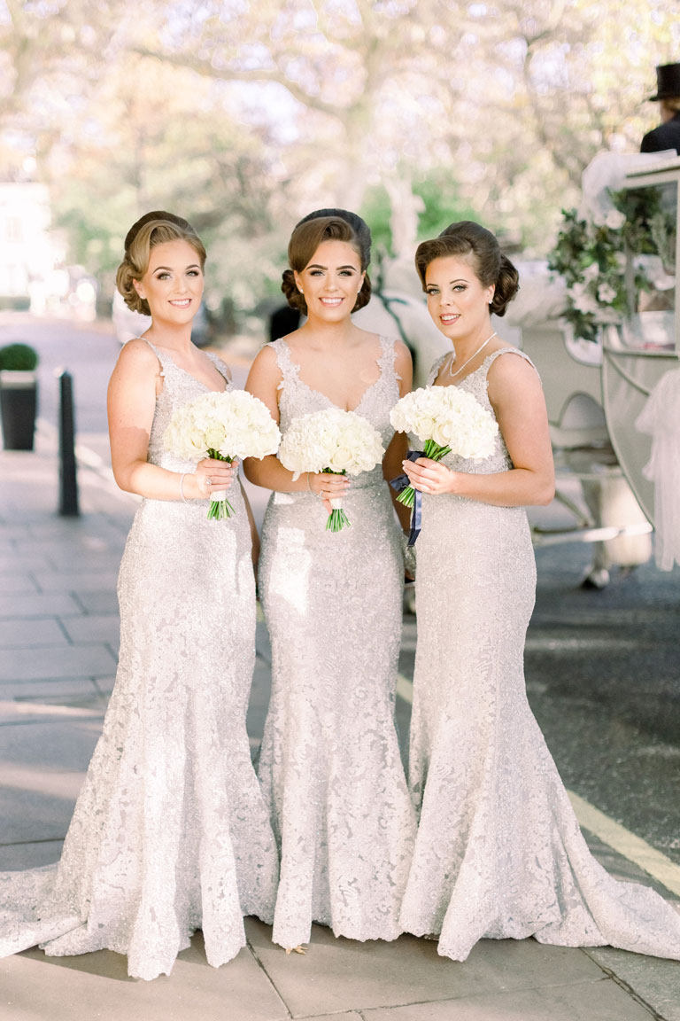 Bridesmaids with their bouquets by Amie Bone Flowers